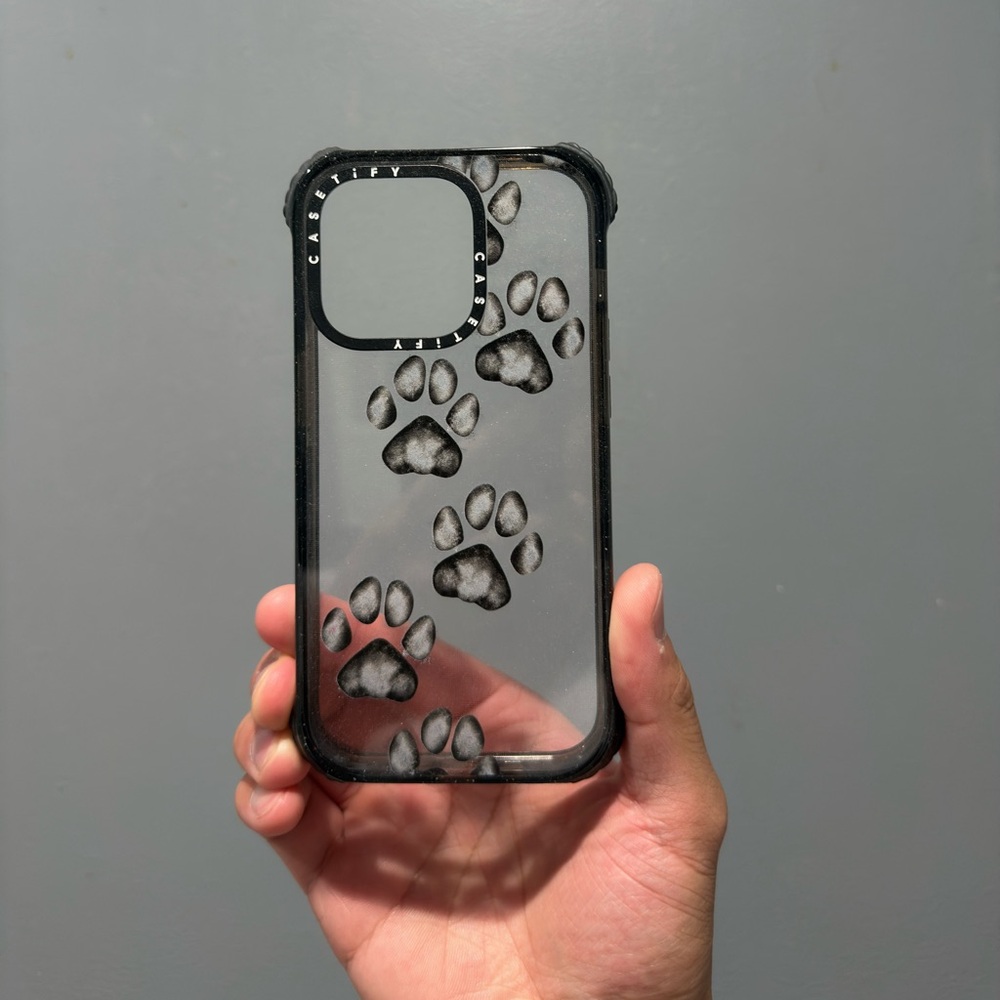 Casetify Clear Phone (14 Pro) Case with Black Paw Prints